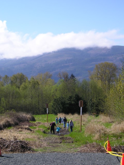 Community members visit the Utopia Conservation Area for the "Festival of Frogs." Photograph credit: Skagit Land Trust staff.