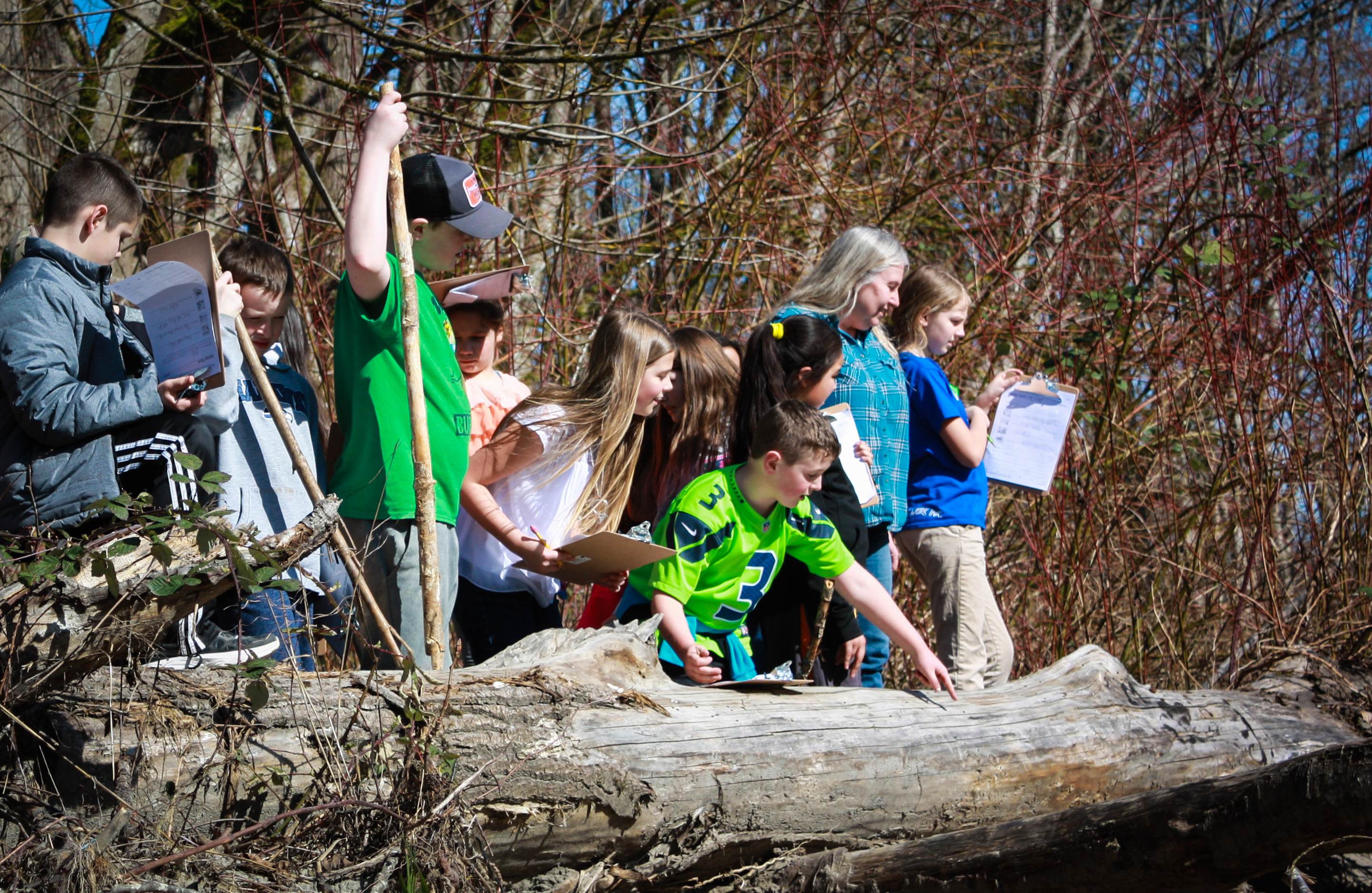 Fifth grade students from Lyman Elementary school participate in field-based environmental education at Lyman Slough, March 2018. Photograph credit: Skagit Land Trust staff.
