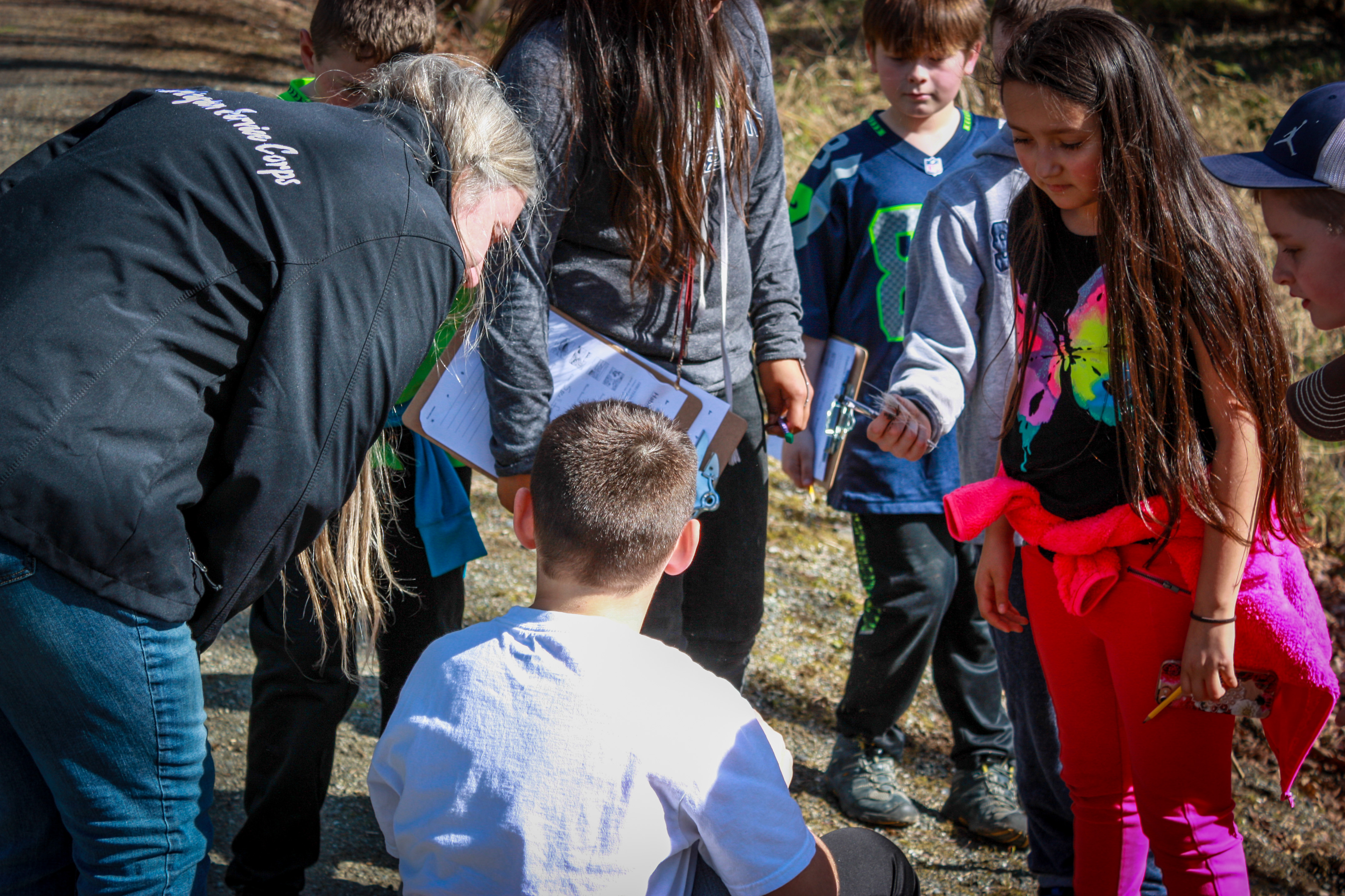 Fifth grade students from Lyman Elementary school participate in field-based environmental education at Lyman Slough, March 2018. Photograph credit: Skagit Land Trust staff.