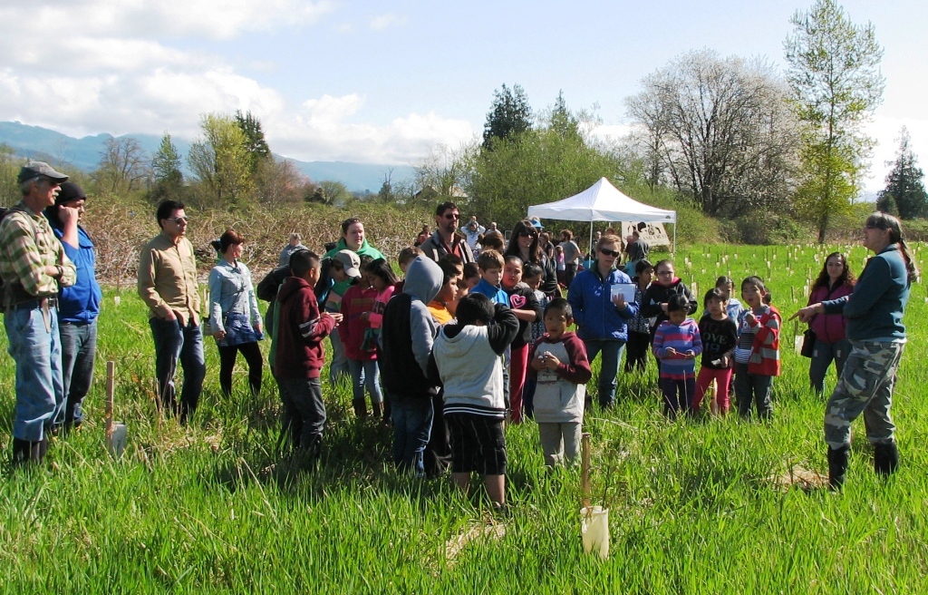 Community members visit the Utopia Conservation Area for the "Festival of Frogs" during the spring of 2014. Photograph credit: Skagit Land Trust staff.